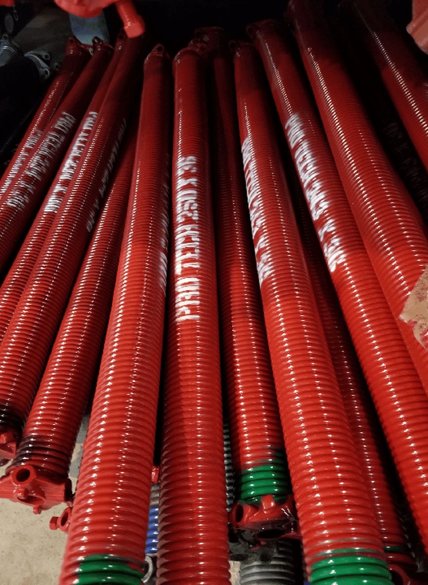 Stack of red garage door springs